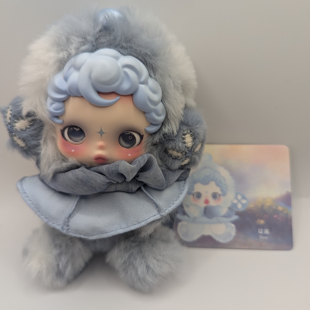 Adorable Plush Doll with Blue Outfit